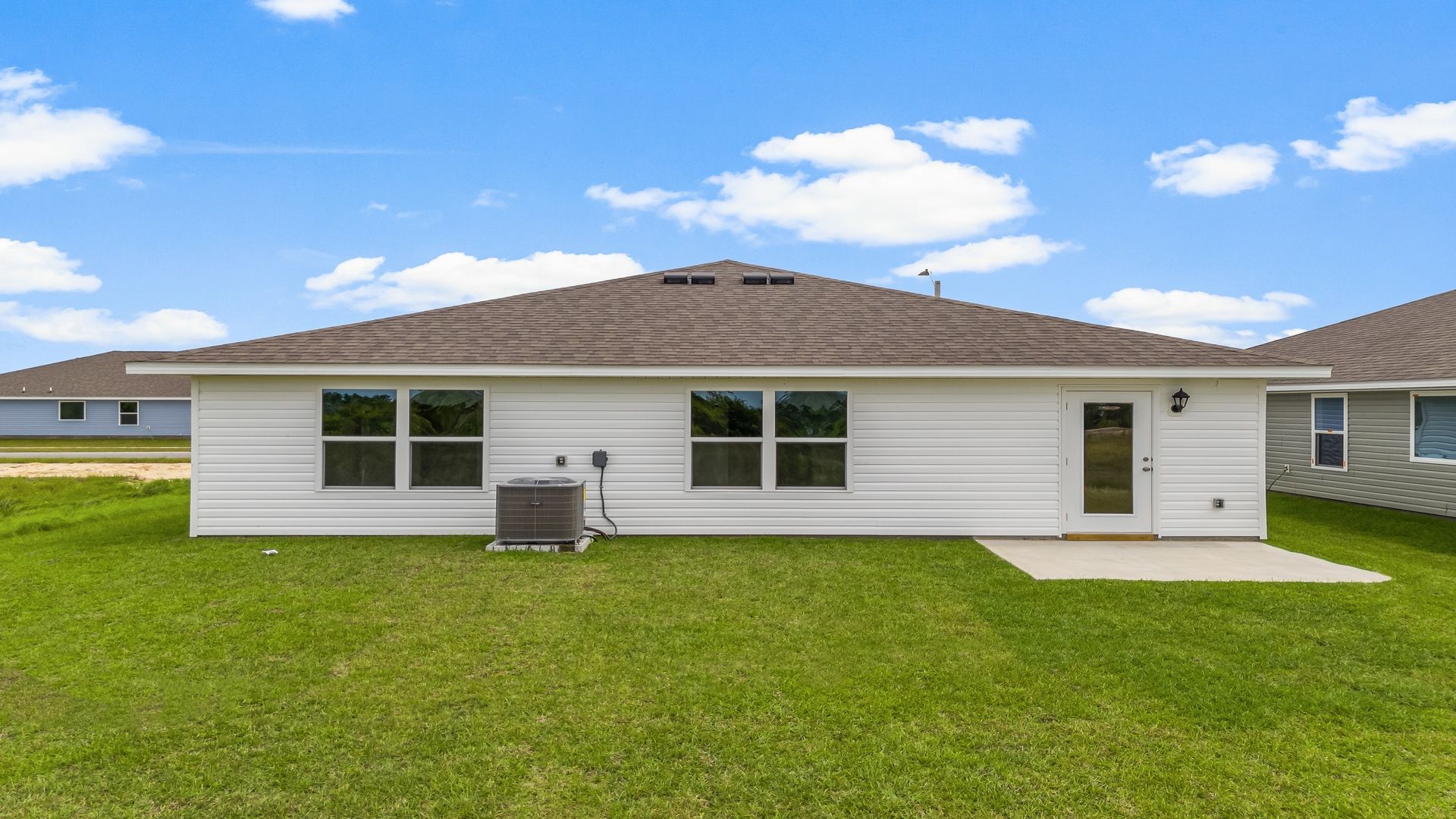 Freeport floor plan at Liberty back patio and back yard.