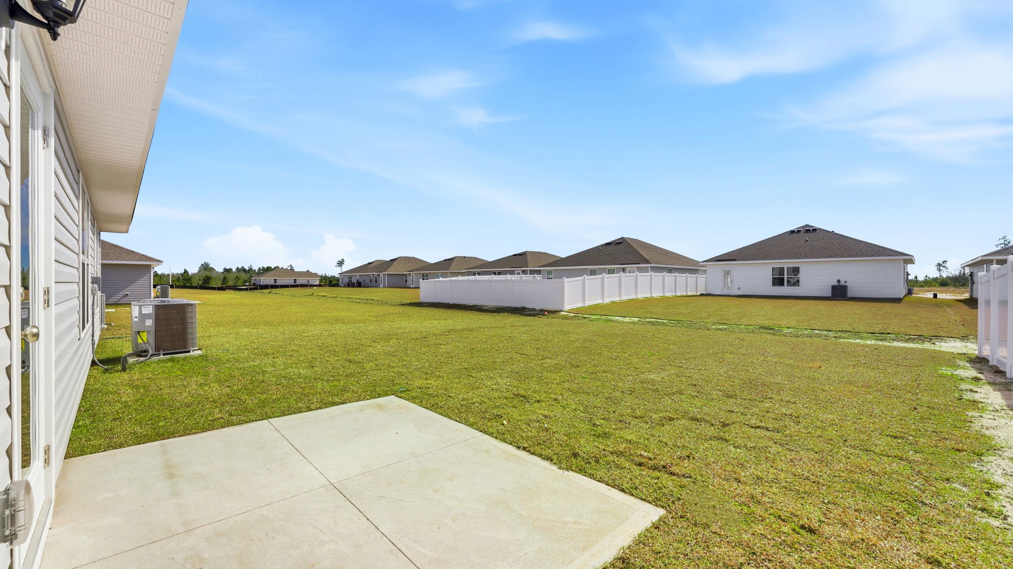Back yard view with back patio.