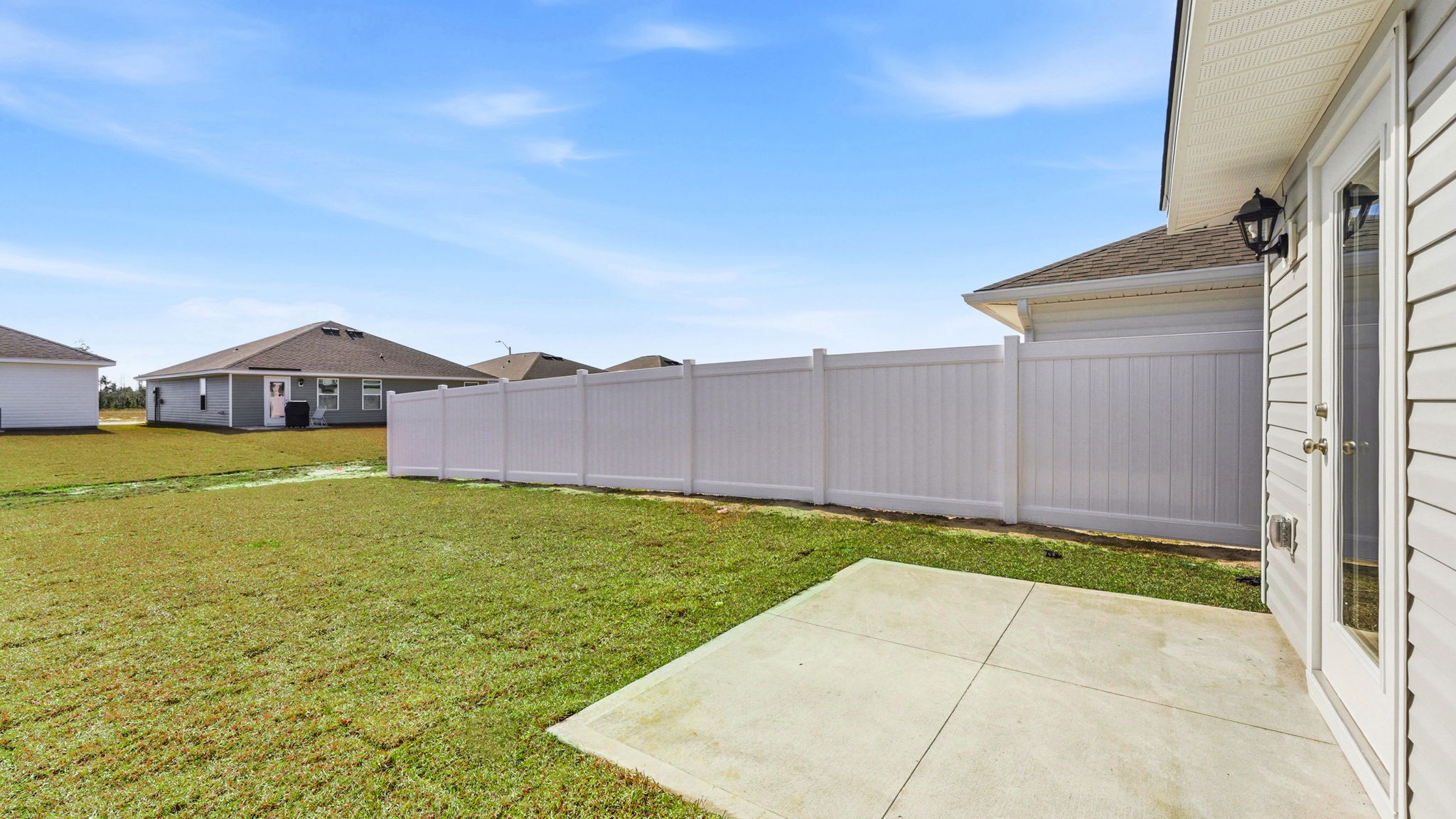 Back yard view with back patio.