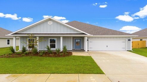 Victoria floor plan at Titus Park with two car garage and covered front porch.