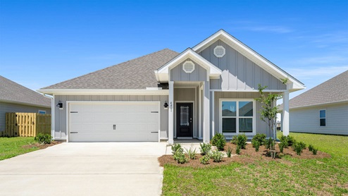 Rhett floor plan at Titus Park with two car garage and covered front porch.