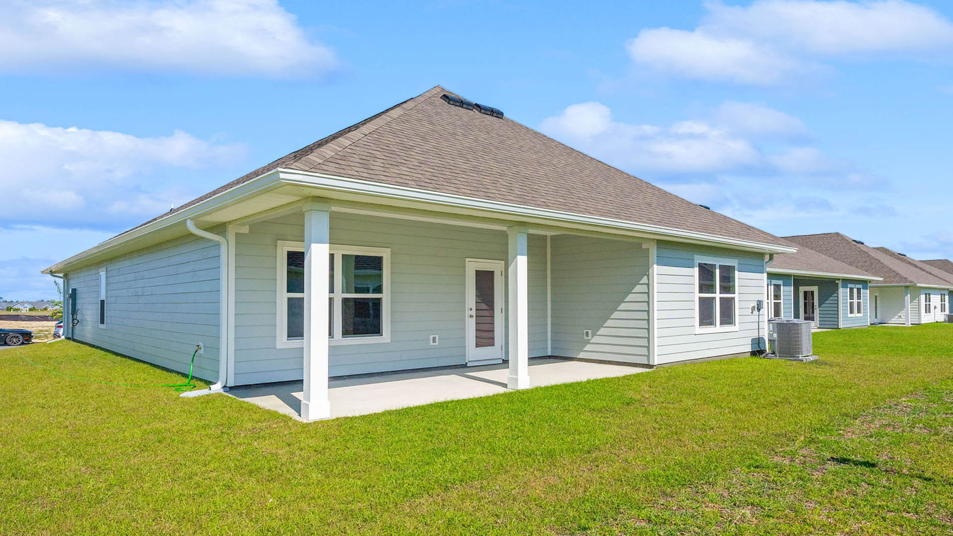 Delray floor plan at Titus Park rear of home with covered back porch.
