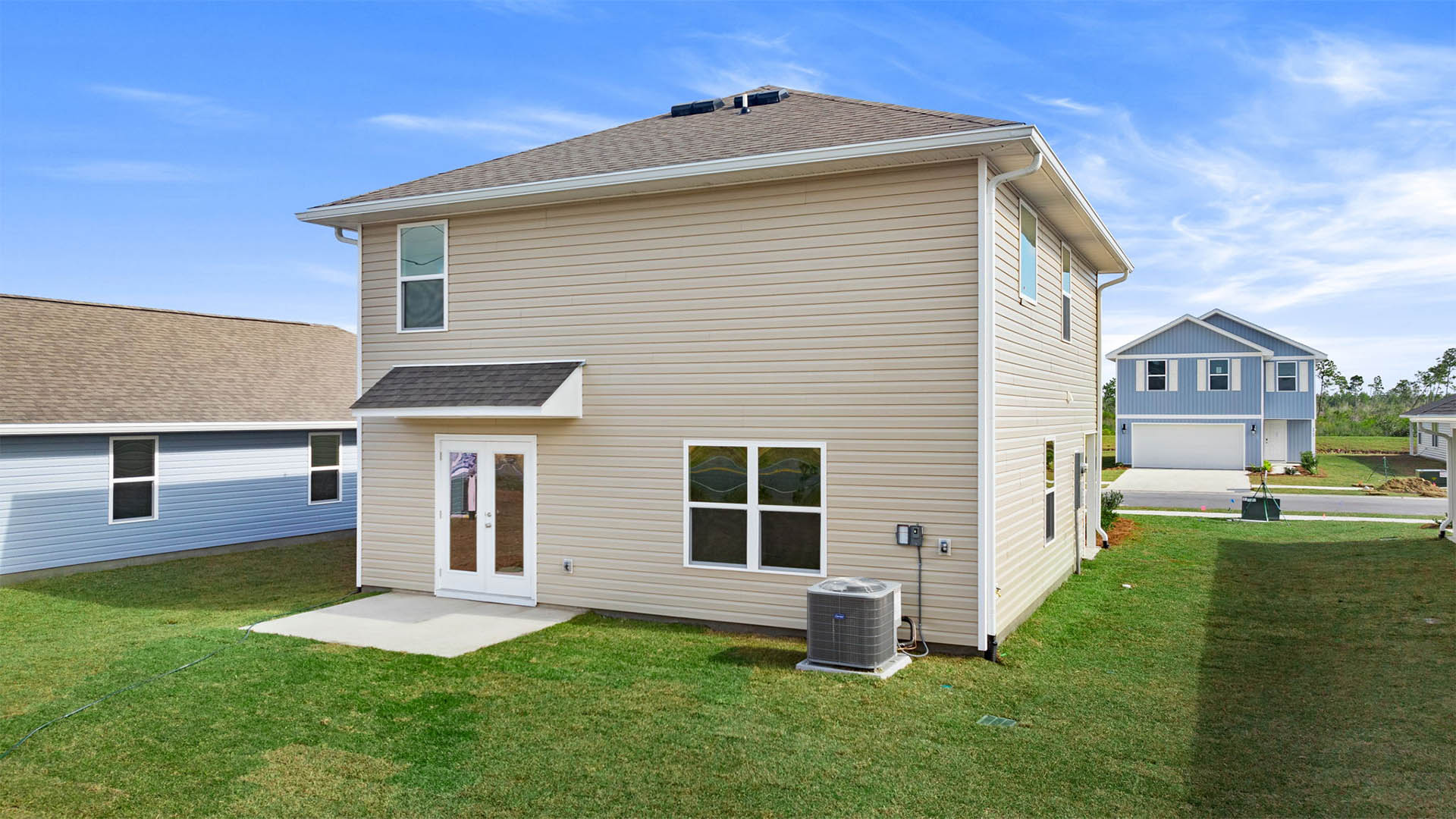 Aisle plan rear of home and yard with patio.