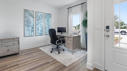 Front room with EVP flooring and window.