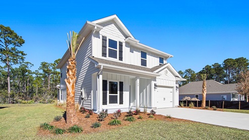 Alabaster floor plan at WindMark Beach with Hardie siding and covered front porch and single car garage.