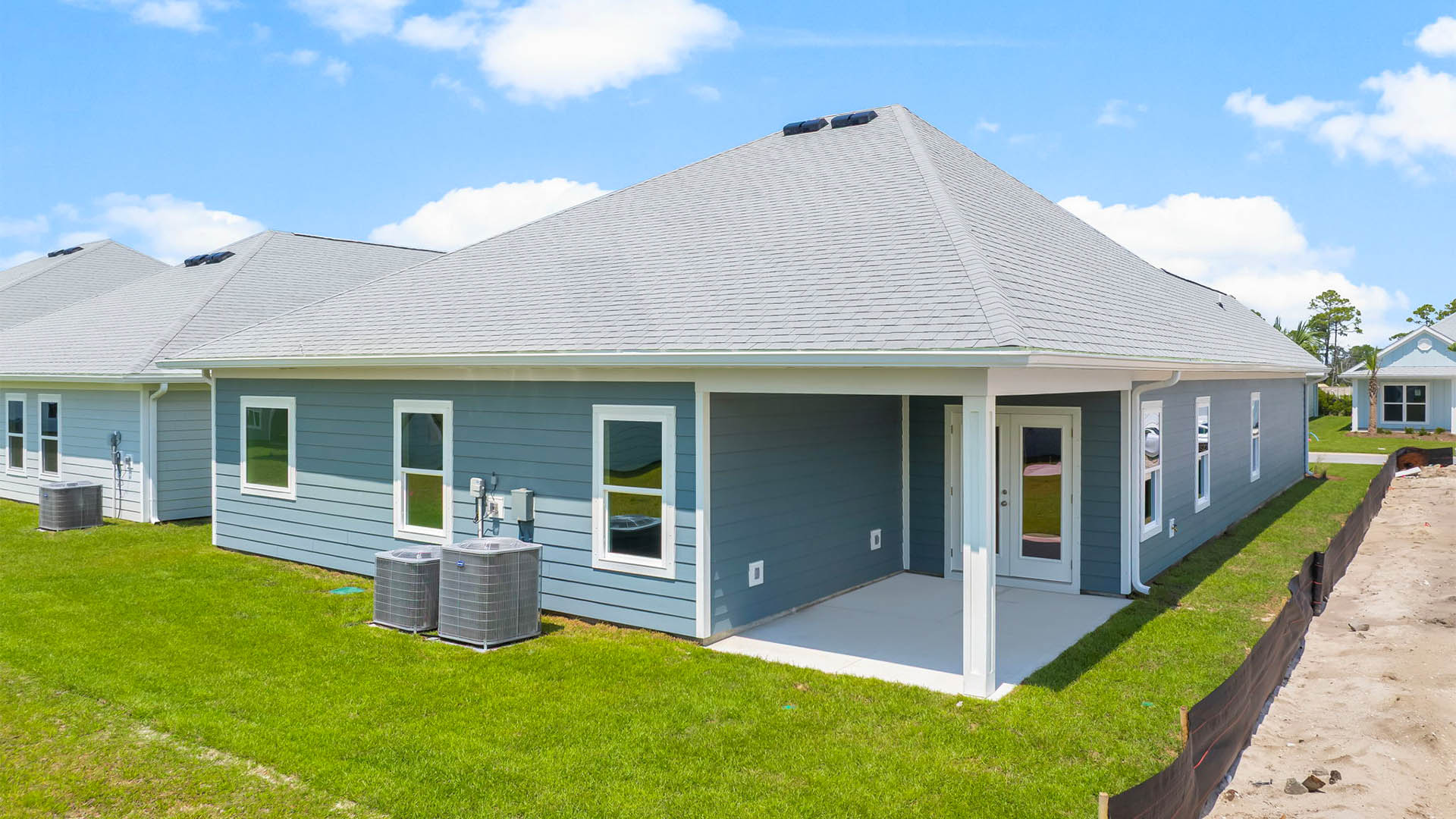 Kennedy floor plan at WindMark Beach rear of home with covered patio.