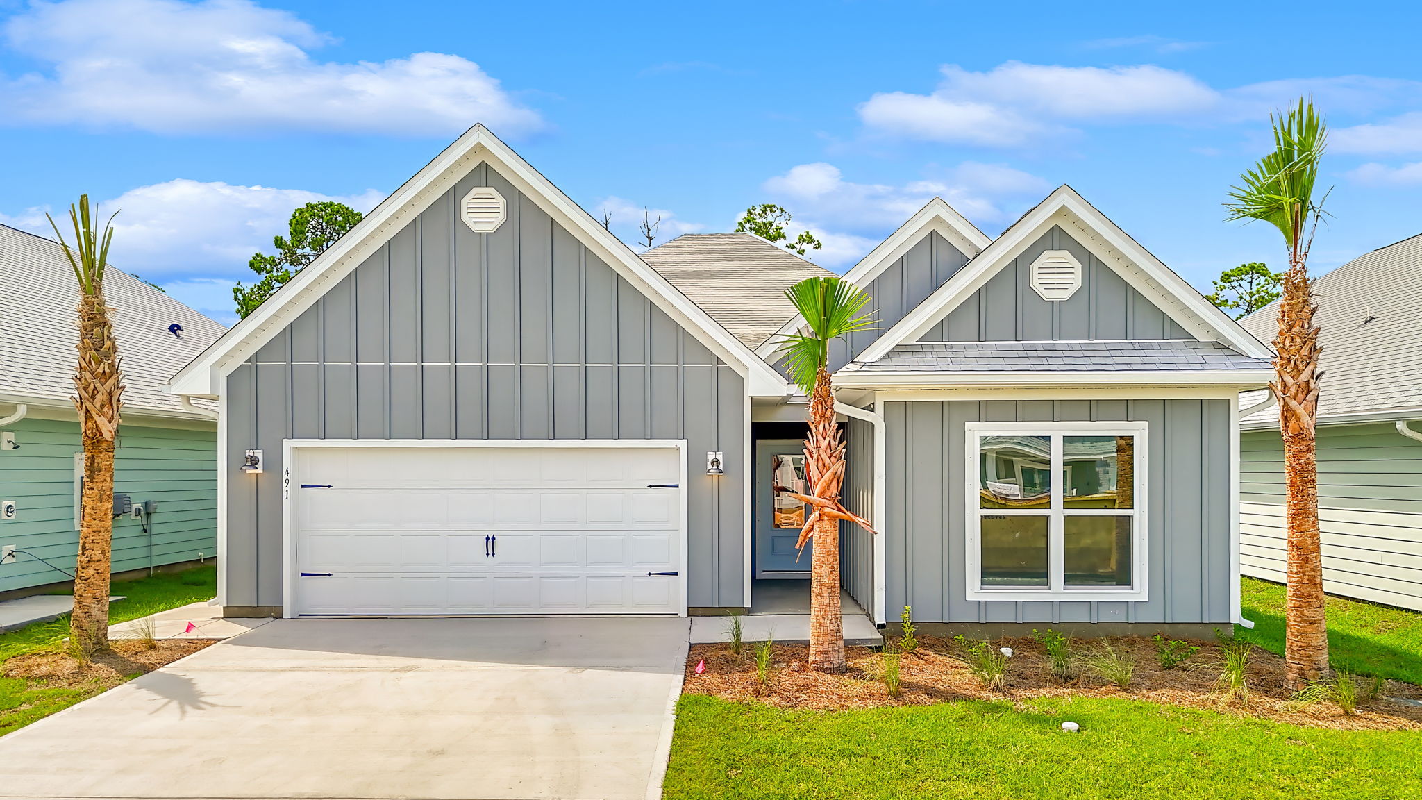 Kennedy floor plan at Windmark Beachfront of home with two-car garage.