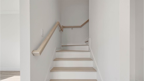 Stairs with wooden paneling.