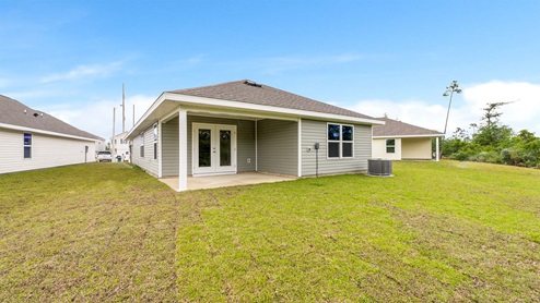 The Jemison floor plan at Titus Park covered back porch and yard.