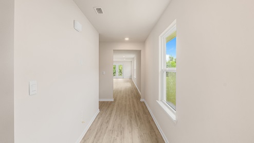 Front entrance hallway with EVP flooring and window.