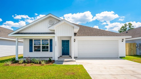 Cali floor plan with vinyl siding and covered front porch and two car garage.