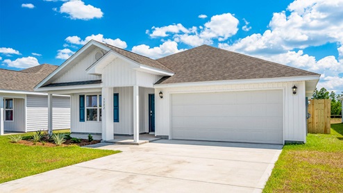 Cali floor plan with vinyl siding and covered front porch and two car garage.
