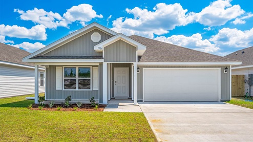 Cali floor plan with vinyl siding and covered front porch.