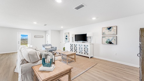 Open living room with EVP flooring.