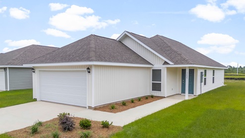 Celeste floor plan at Morningside front of home with vinyl siding and two car garage.