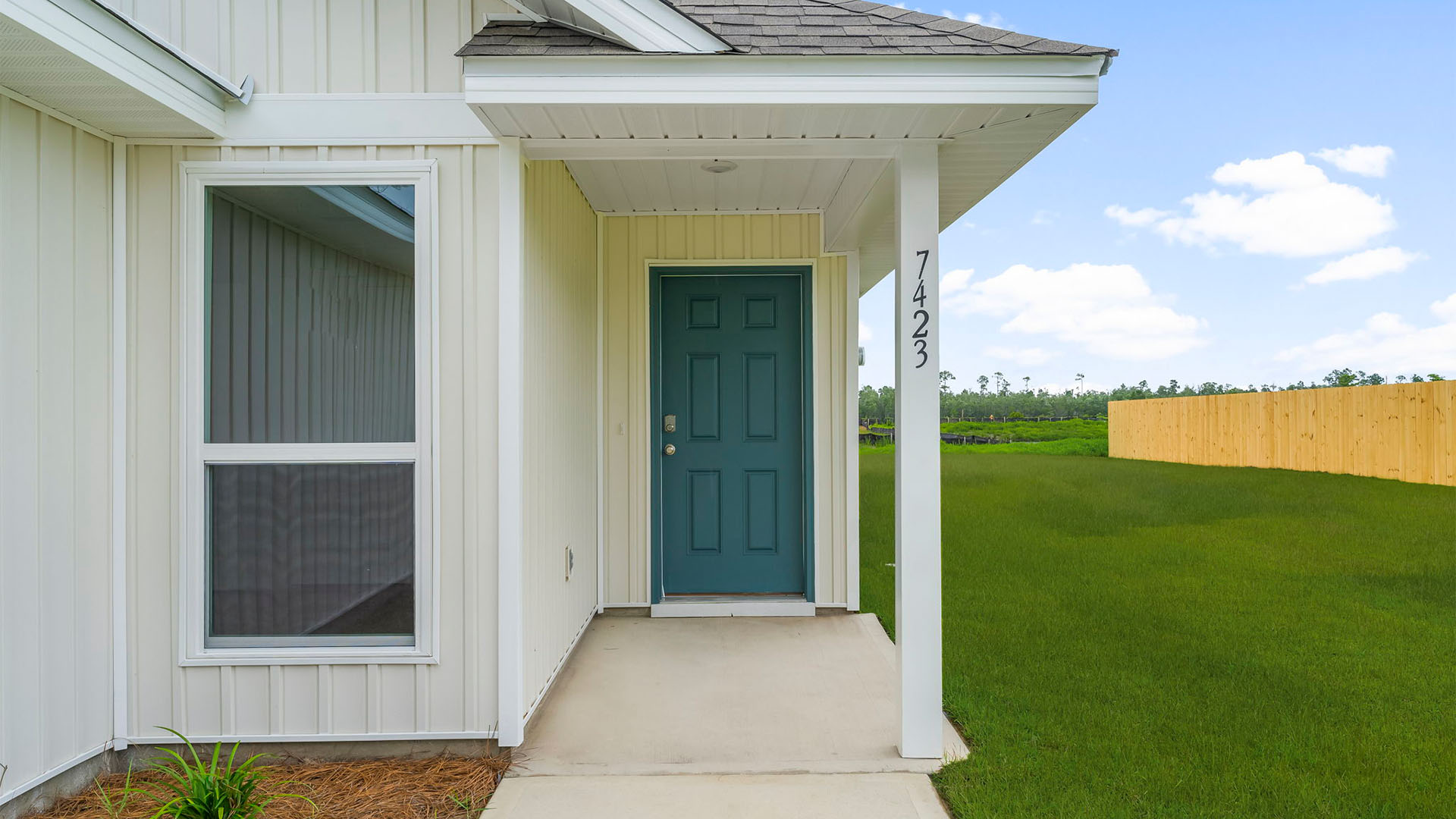 Front door with covered entrance.