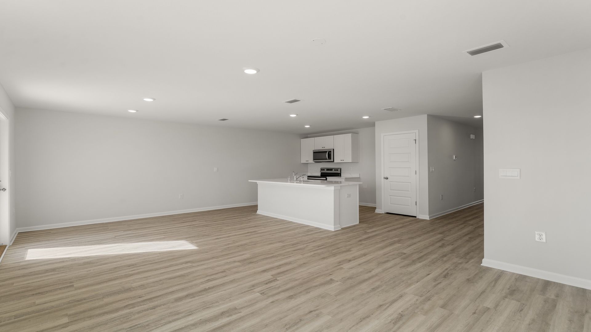 Open living room and kitchen and dining room.