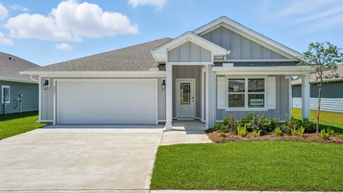 Cali floor plan at Palmetto Bluff with Hardie Board siding and 2 car garage and covered front porch.