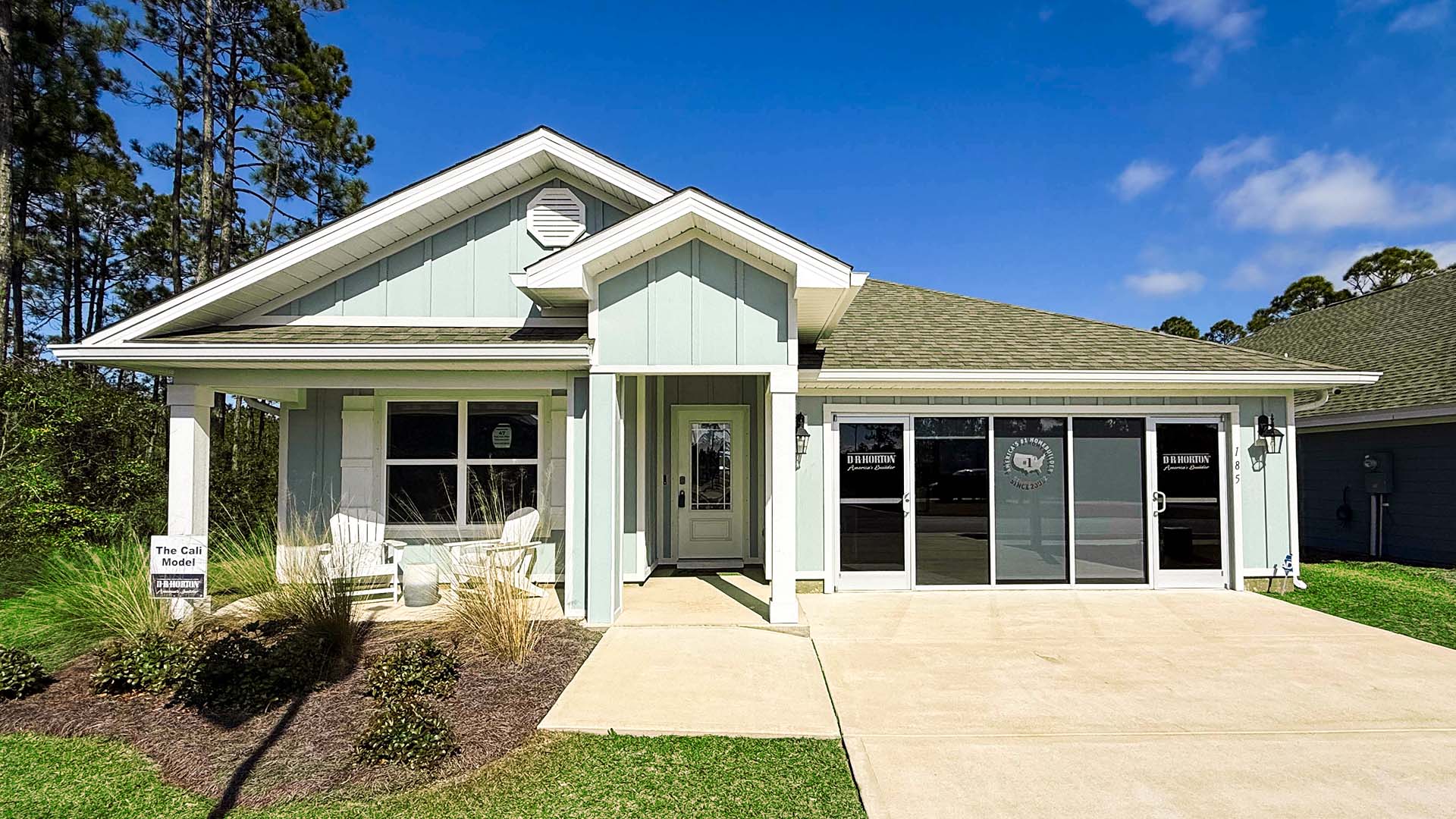 Cali floor plan at Palmetto Bluff with Hardie Board siding and 2 car garage and covered front porch.