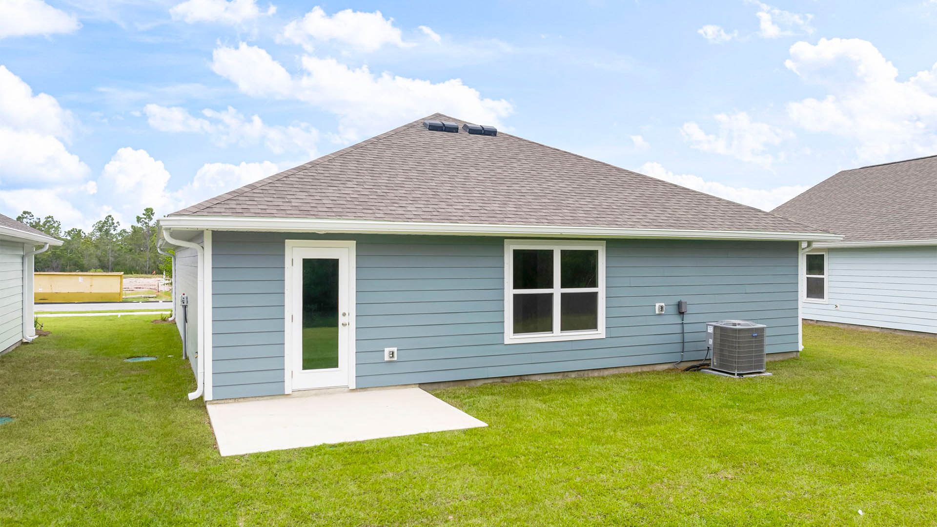 Aldridge floor plan at Palmetto Bluff rear of home with patio and back yard.