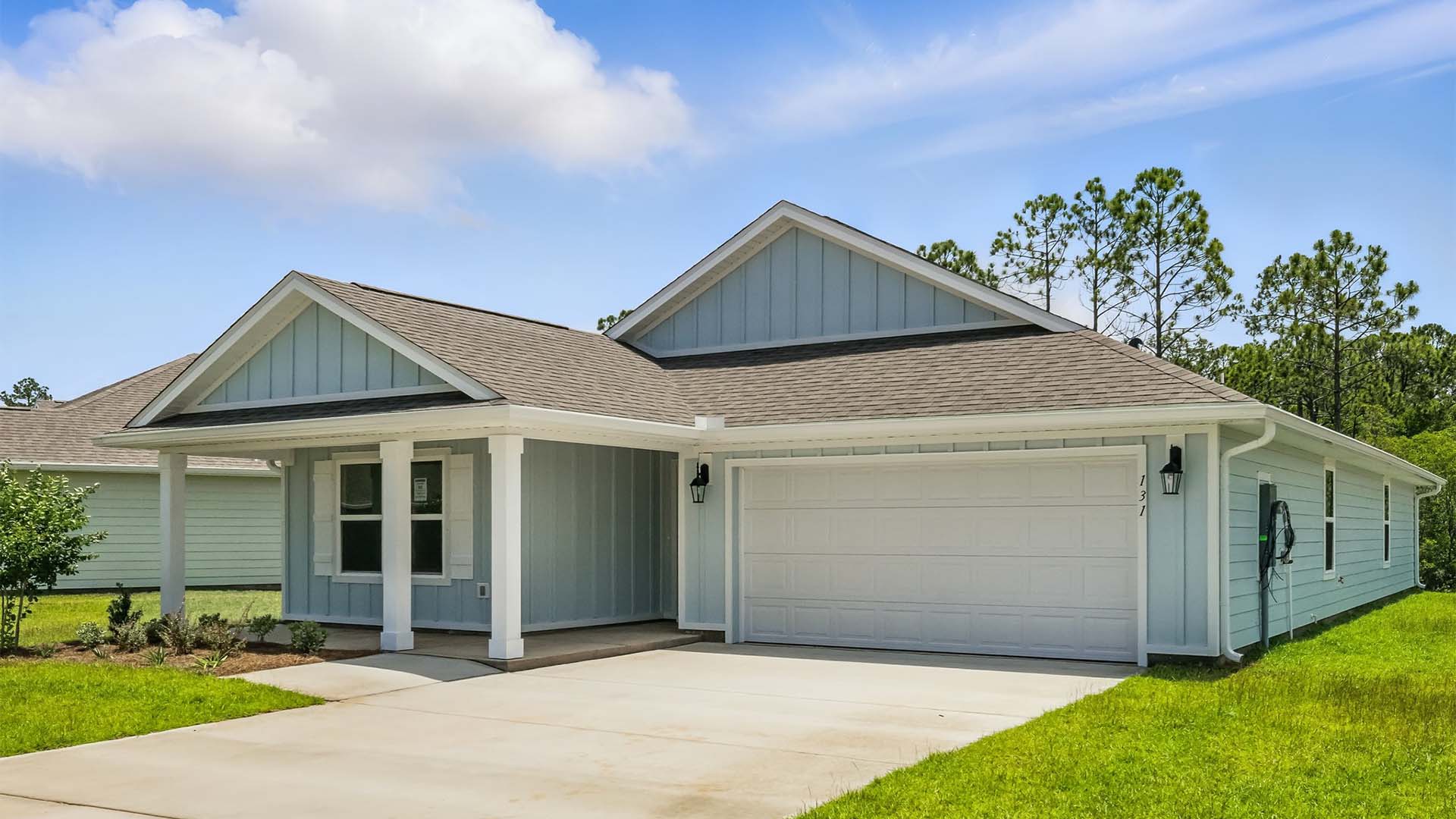 Lakeside Floor plan at Palmetto Bluff with Hardie Board Siding covered front porch and 2 car garage.