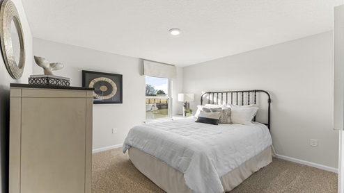 Bedroom with carpet floors.