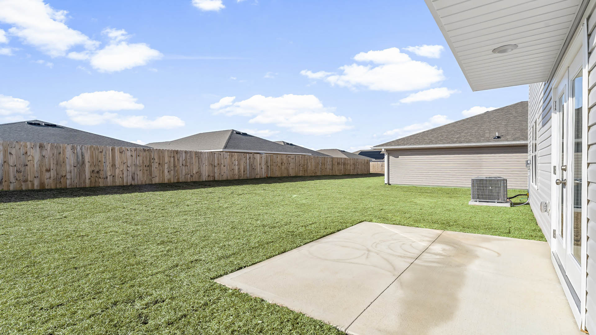 Aisle model at Park Place rear of home and yard.