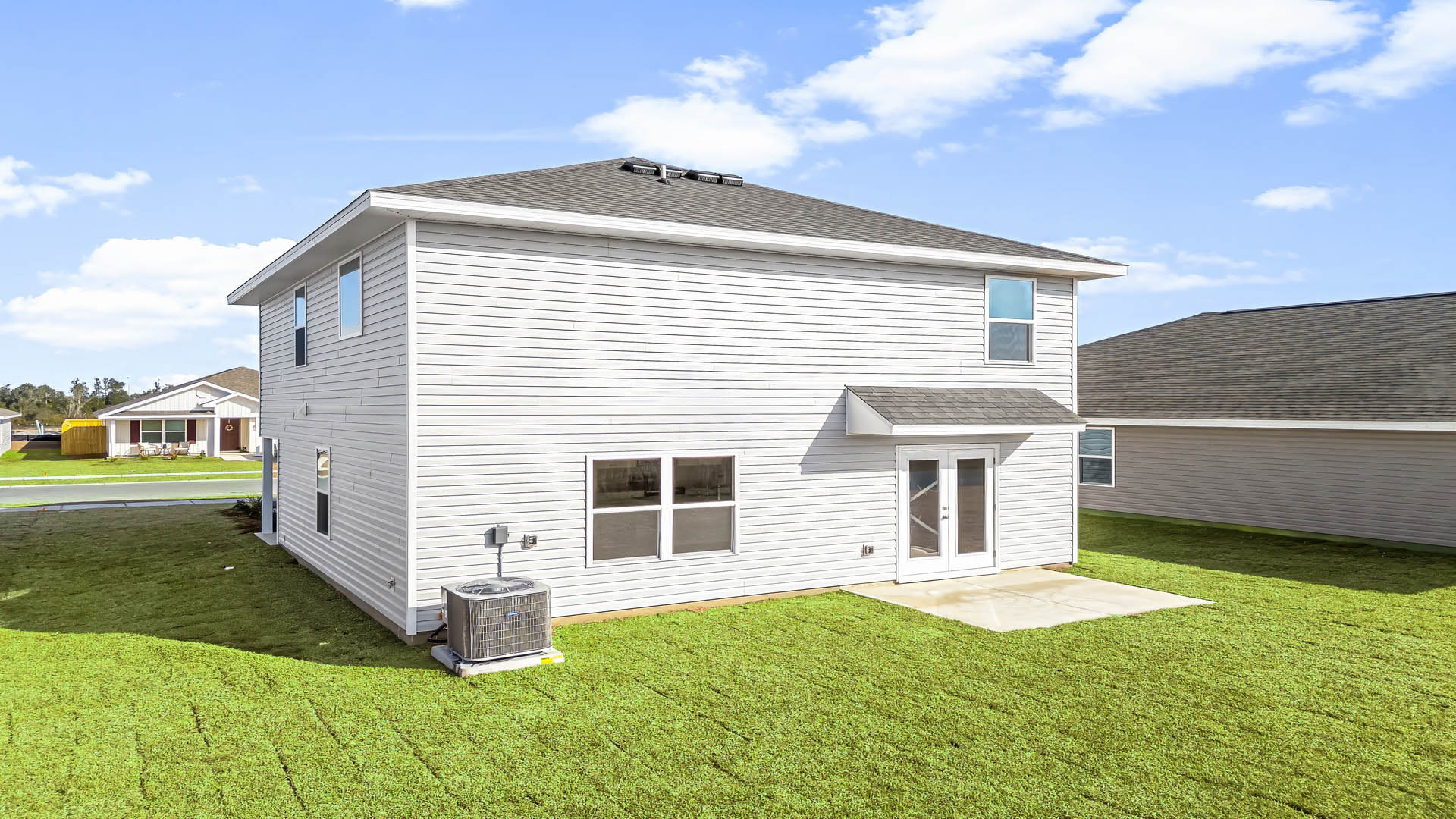 Aisle model at Park Place rear of home and yard.