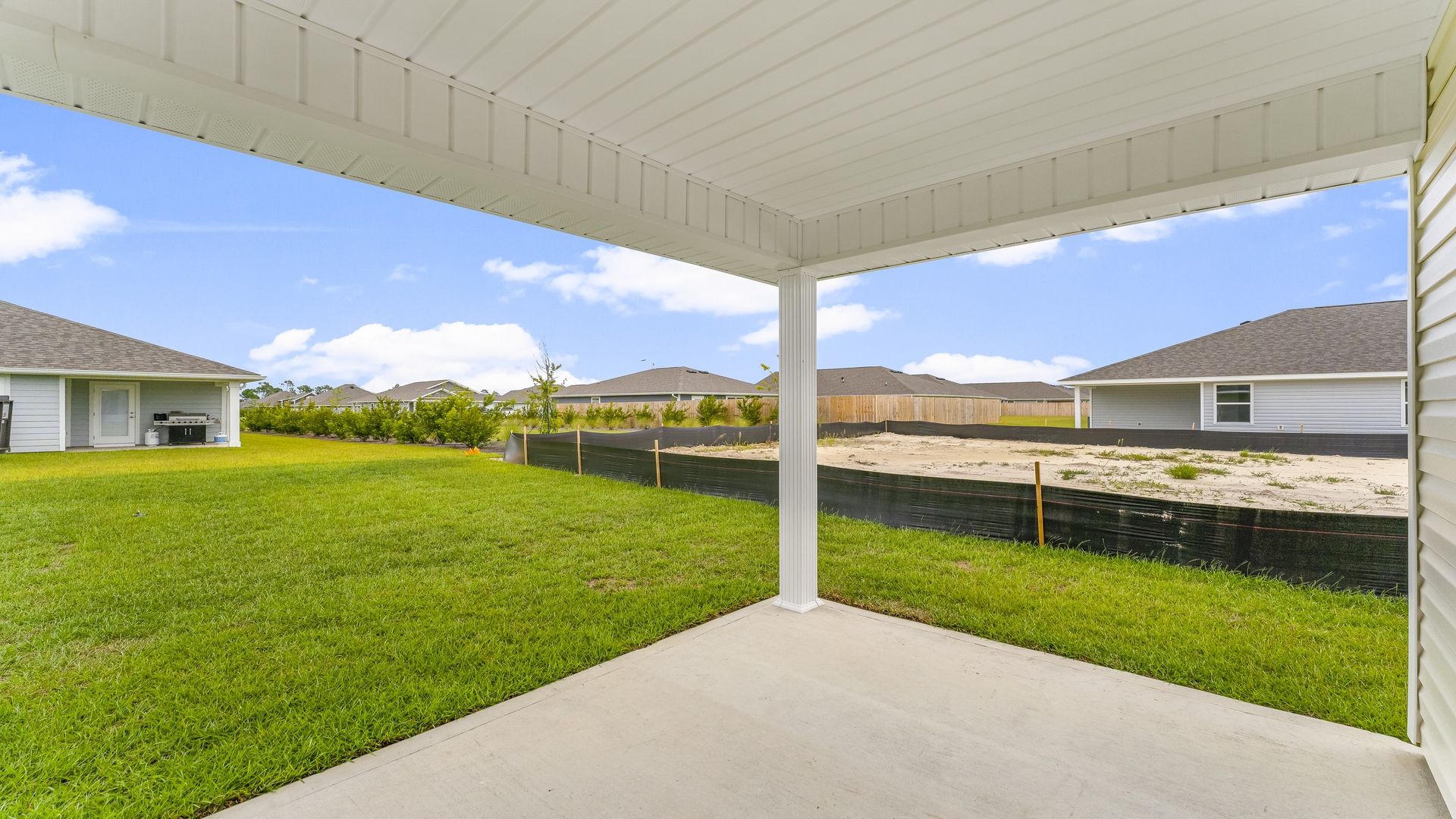 Covered rear patio of Cali floor plan at Park Place.