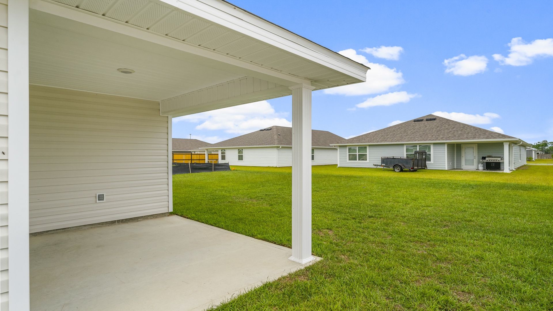 Covered rear patio of Cali floor plan at Park Place.