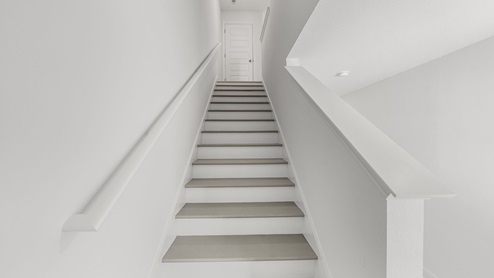 Staircase with grey wooden steps.