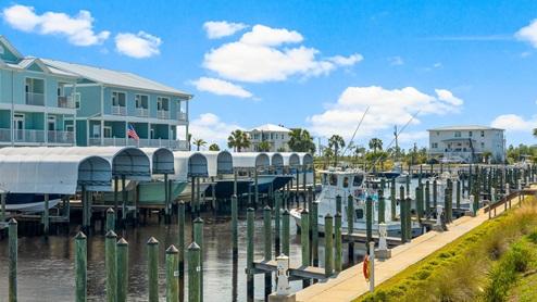 Mexico Beach harbor with boats and condos.