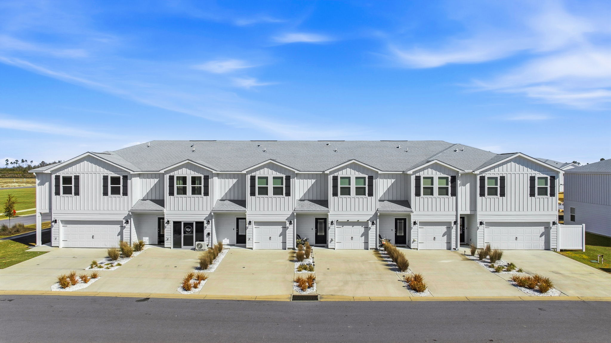 Two car garage with water heater.