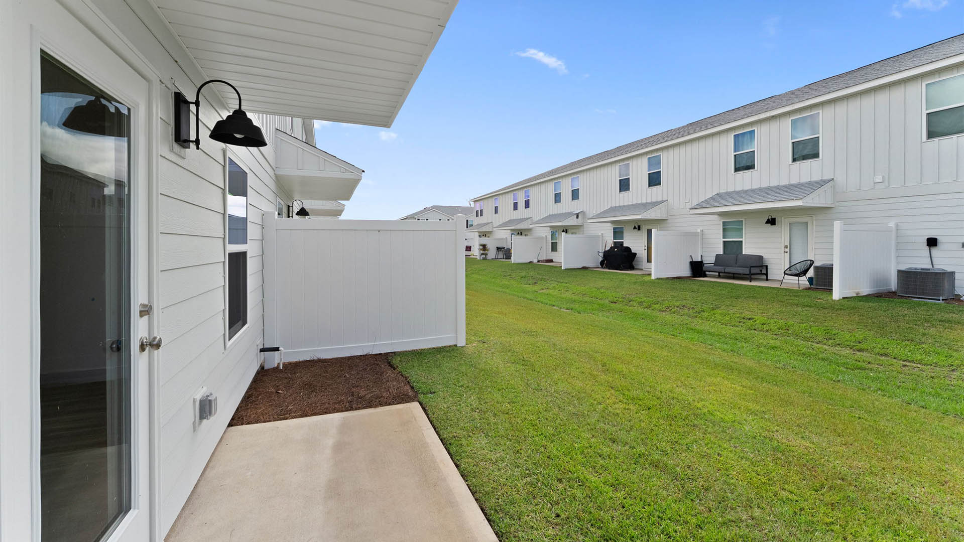 Back yards of townhomes at Salt Creek Townhomes.