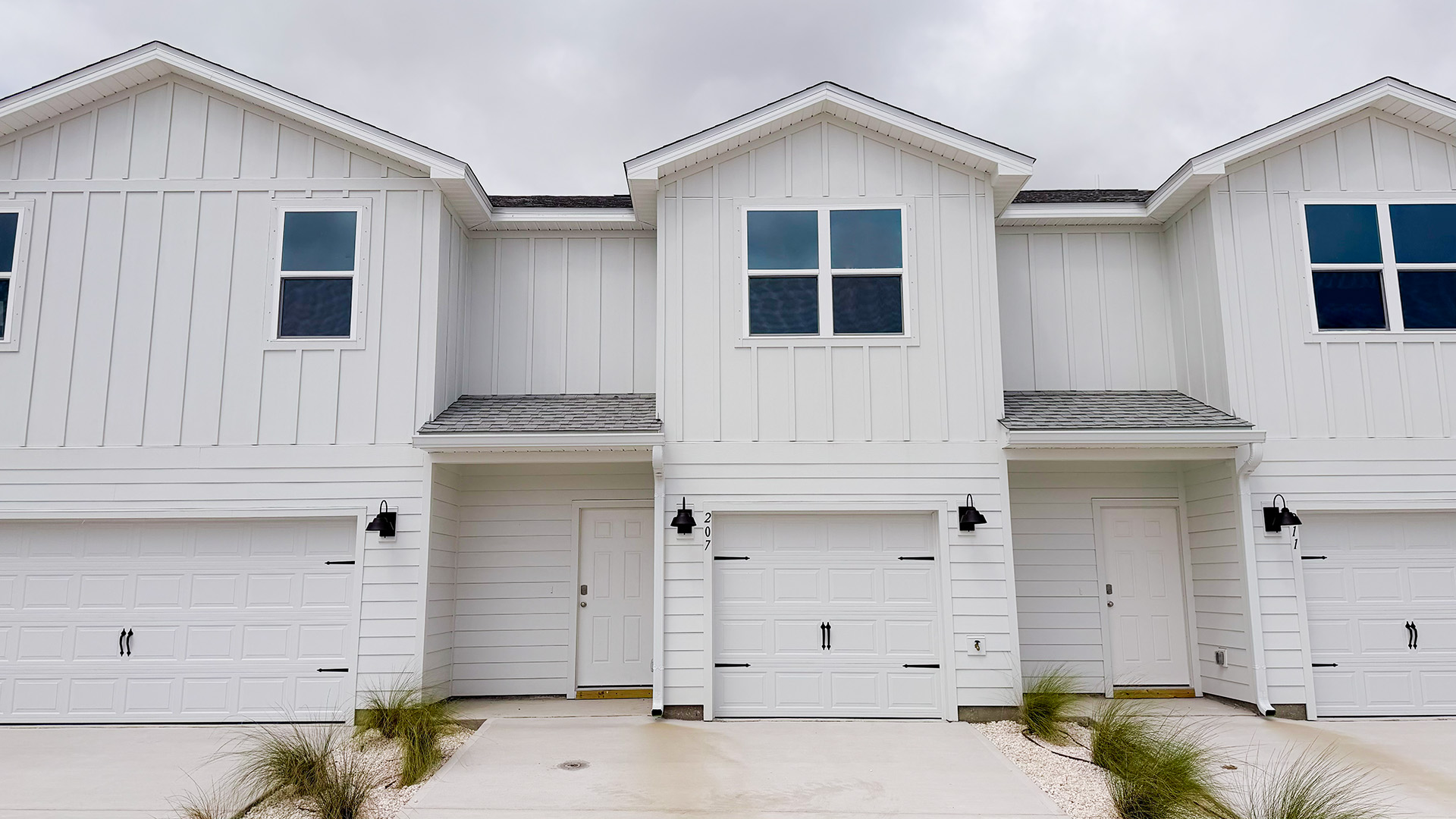 Sabal townhome with single car garage and Hardie siding.