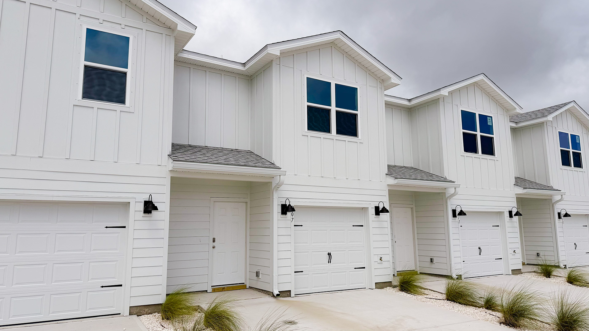 Sabal townhome with single car garage and Hardie siding.