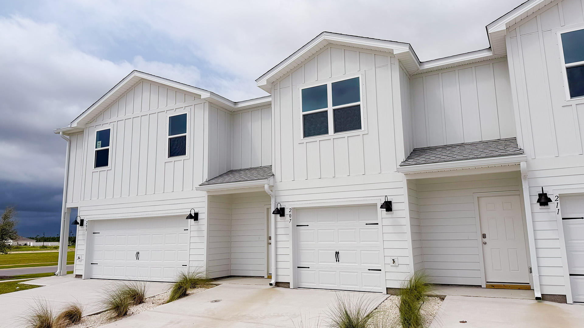 Sabal townhome with single car garage and Hardie siding.