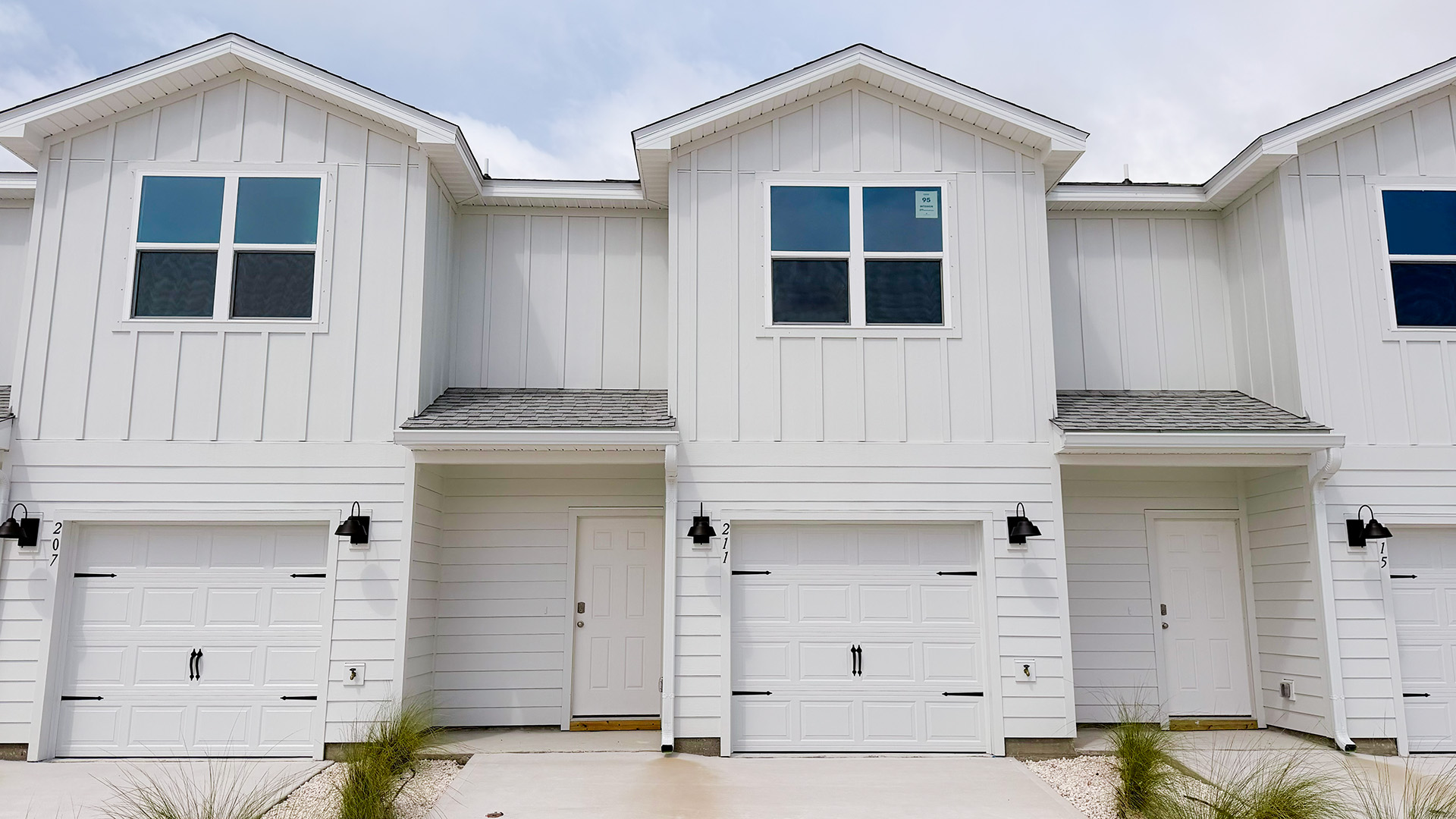 Sabal townhome with single car garage and Hardie siding.