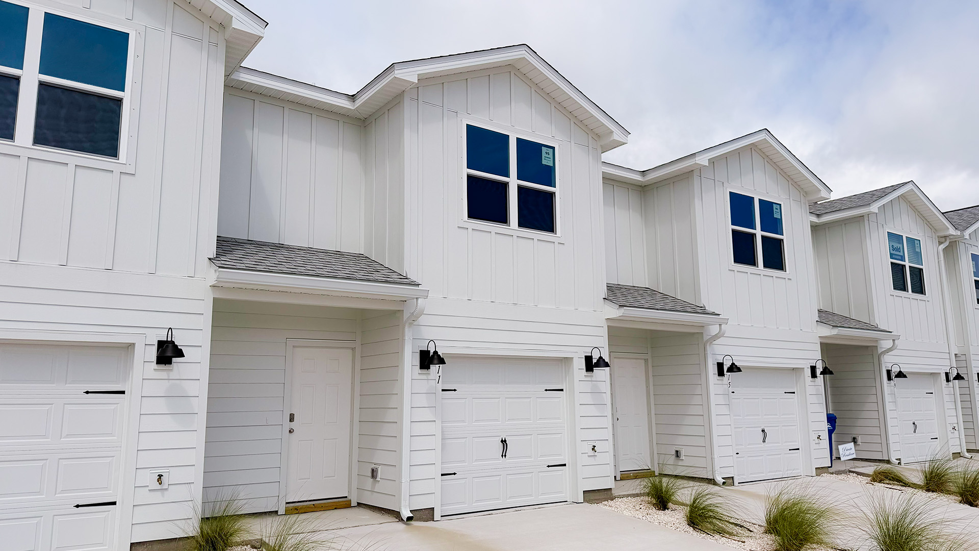 Sabal townhome with single car garage and Hardie siding.