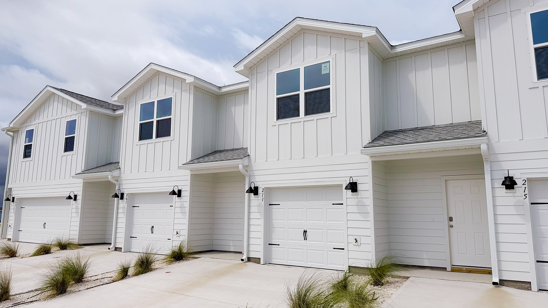 Sabal townhome with single car garage and Hardie siding.