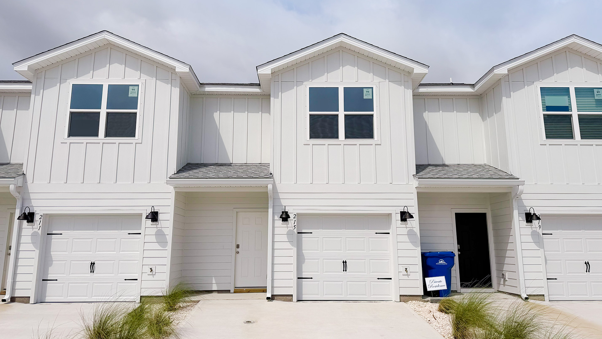Sabal townhome with single car garage and Hardie siding.