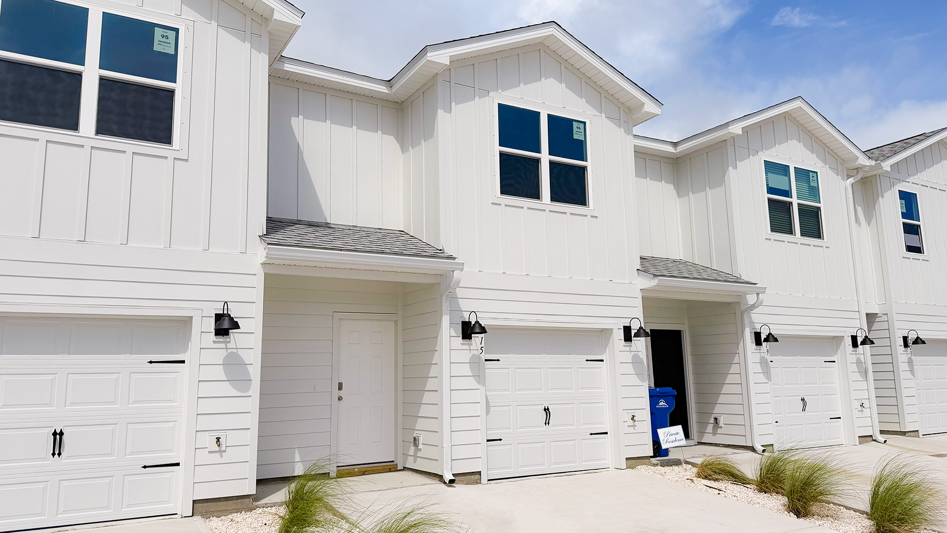 Sabal townhome with single car garage and Hardie siding.