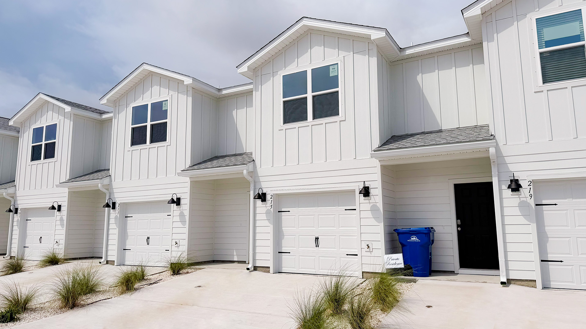 Sabal townhome with single car garage and Hardie siding.