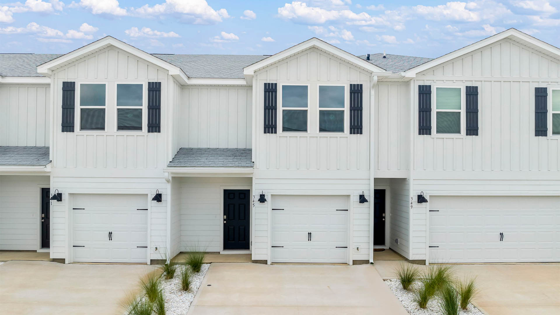 Sabal townhome with single car garage and Hardie siding.