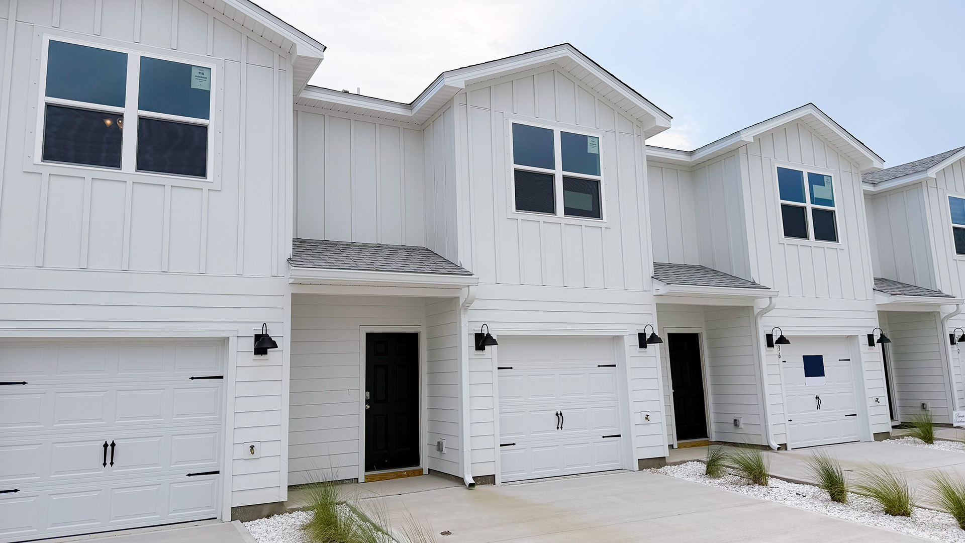 Sabal townhome with single car garage and Hardie siding.