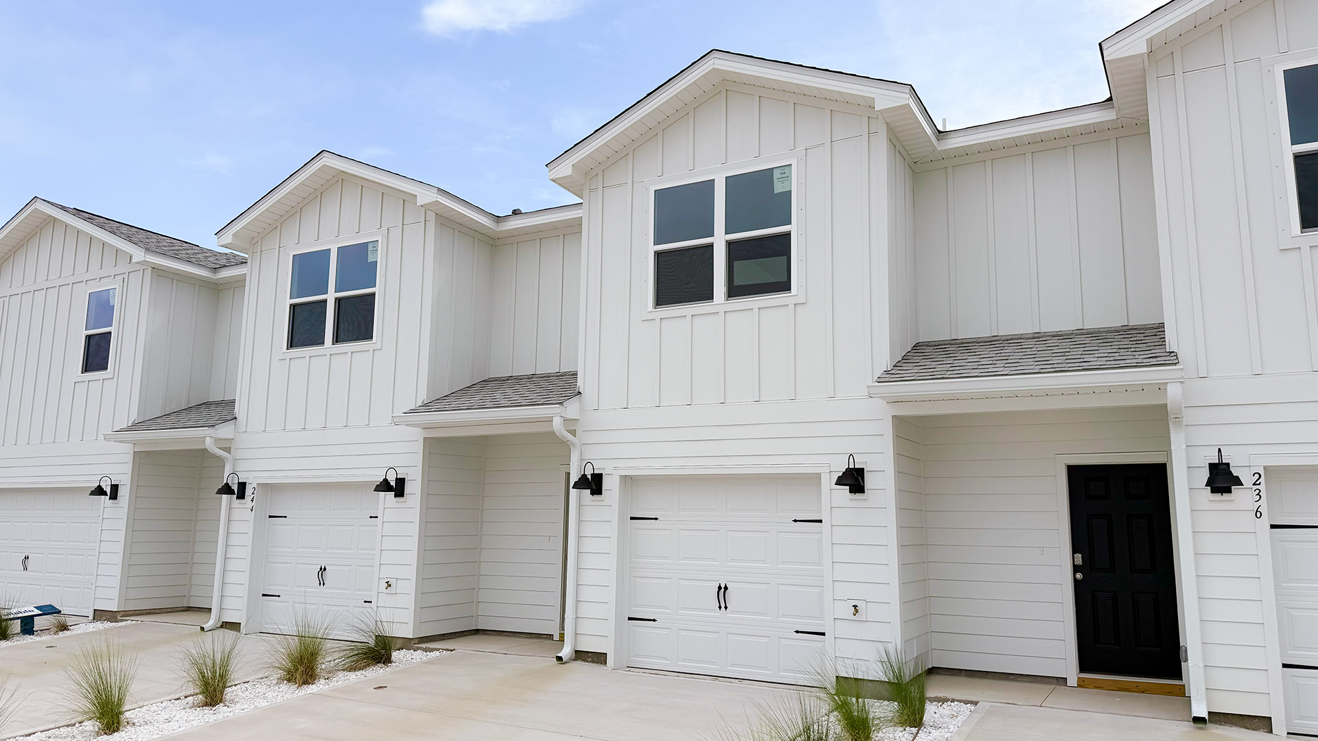 Sabal townhome with single car garage and Hardie siding.