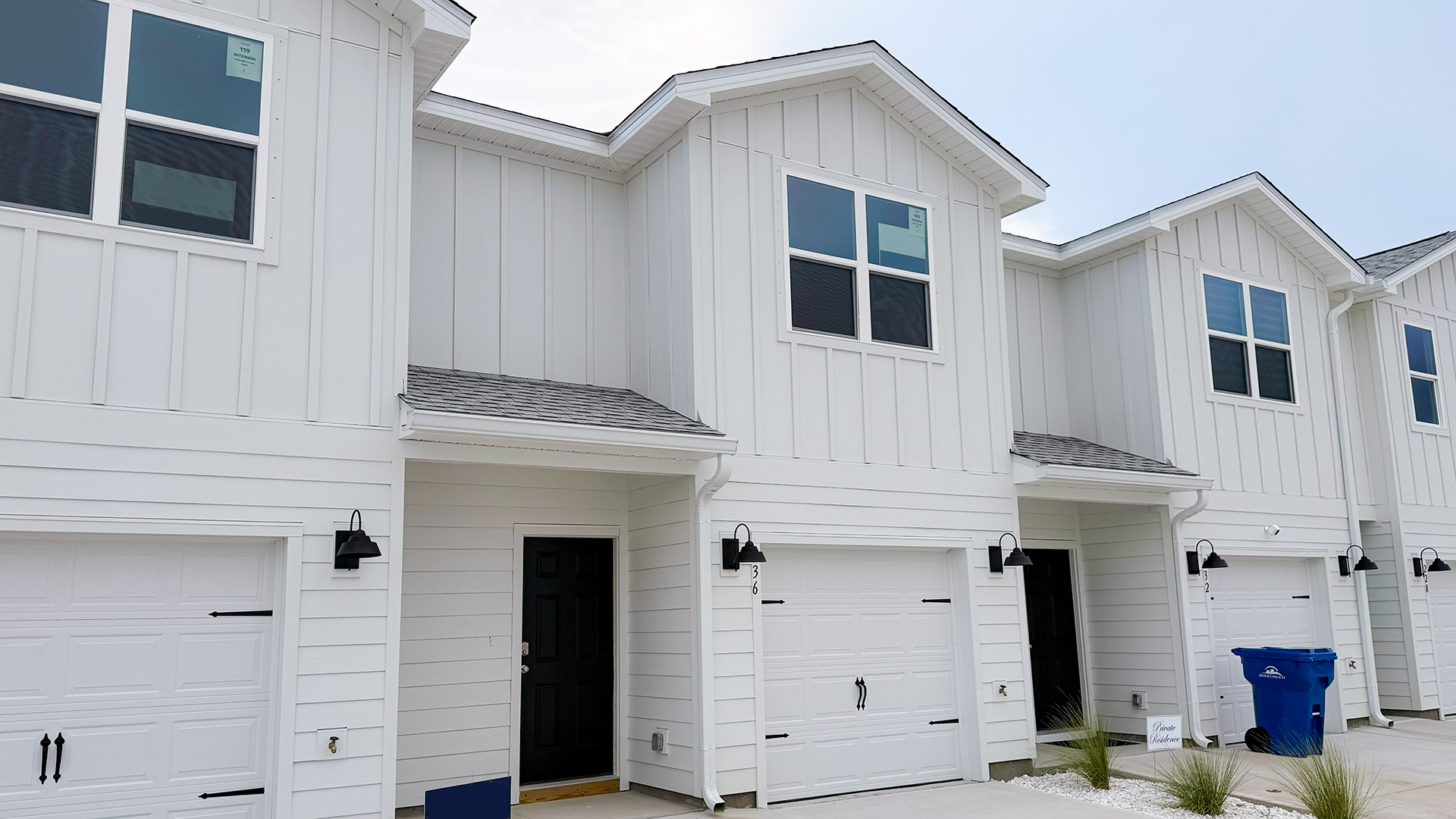 Sabal townhome with single car garage and Hardie siding.