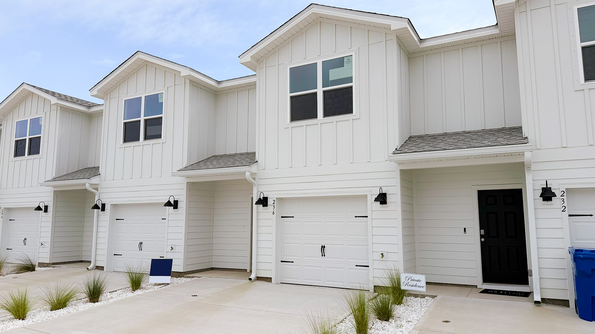 Sabal townhome with single car garage and Hardie siding.