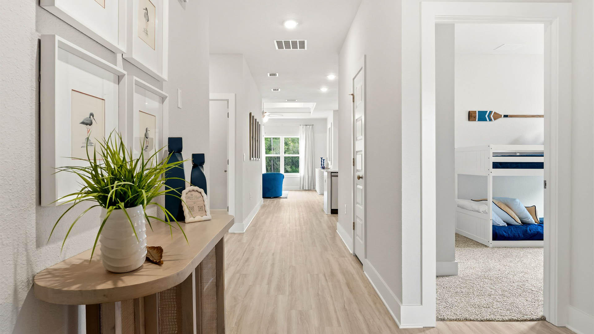 Front entrance with front door and closet next to bedrooms and bathroom.