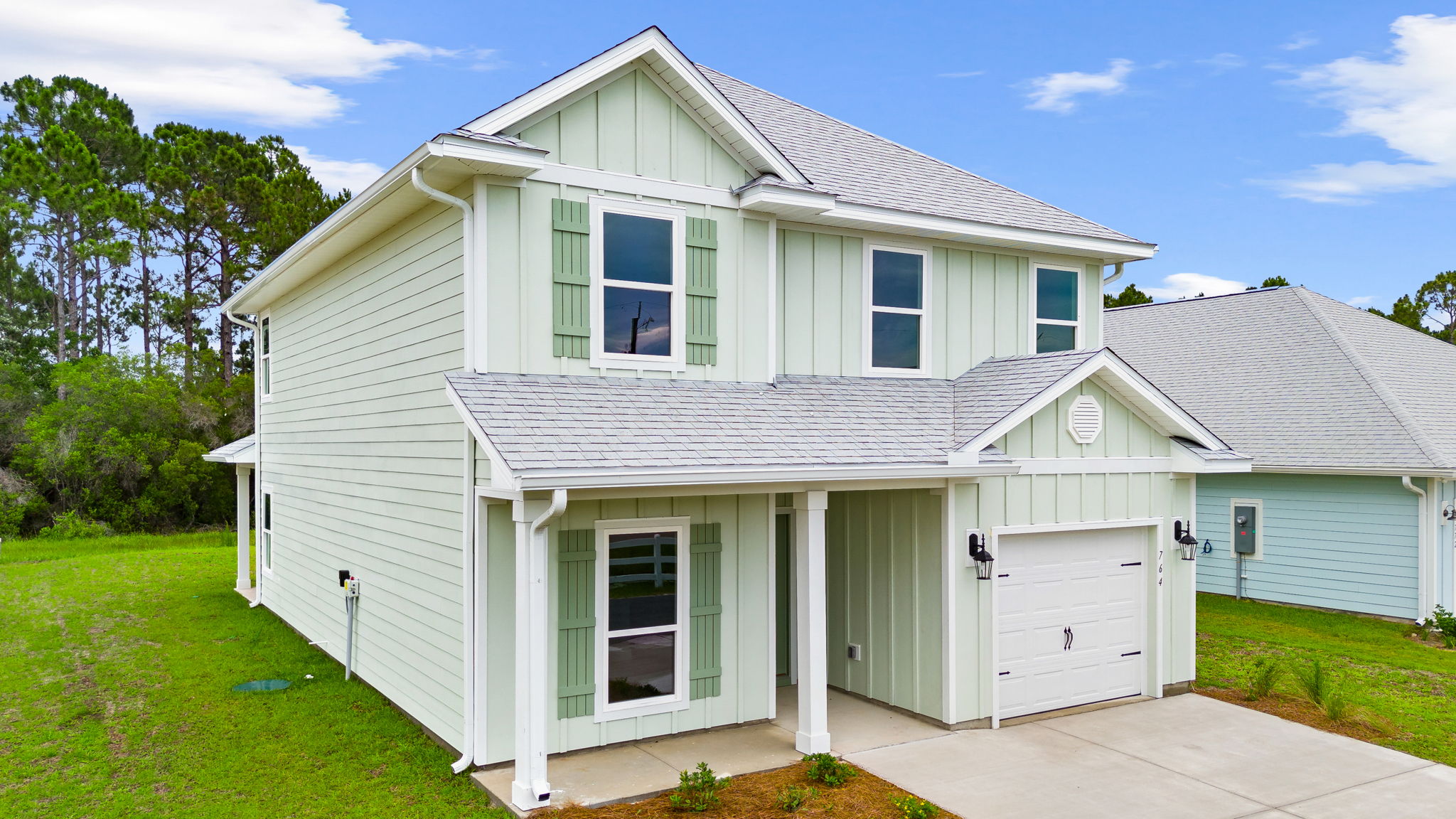 Alabaster floor plan at Buffer Farms with Hardie siding and covered front porch and single car garage.